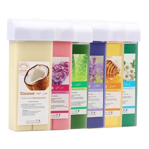 Flacon de cire à rouler indolore pour l'épilation à côté d'une ligne de boîtes colorées, avec miel, fleurs et noix de coco en décor.