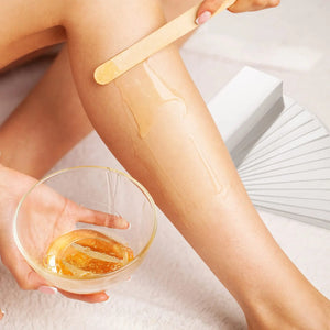 Non-woven hair removal wax strip
